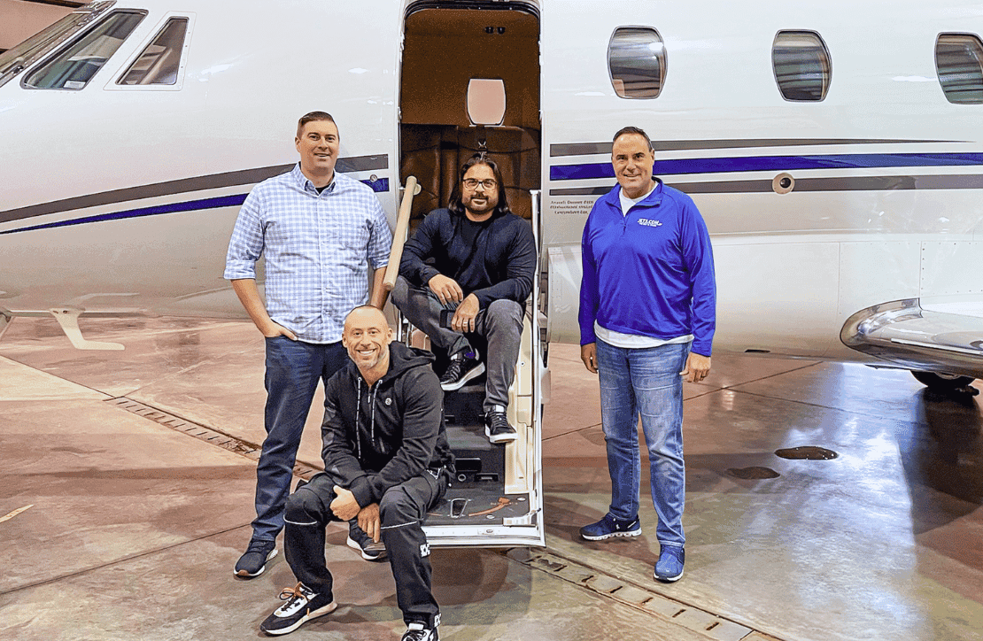 New co-owners of PJC in front of a private jet